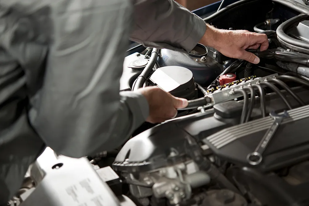 Can Worn Spark Plugs Make My Car Idle Roughly?