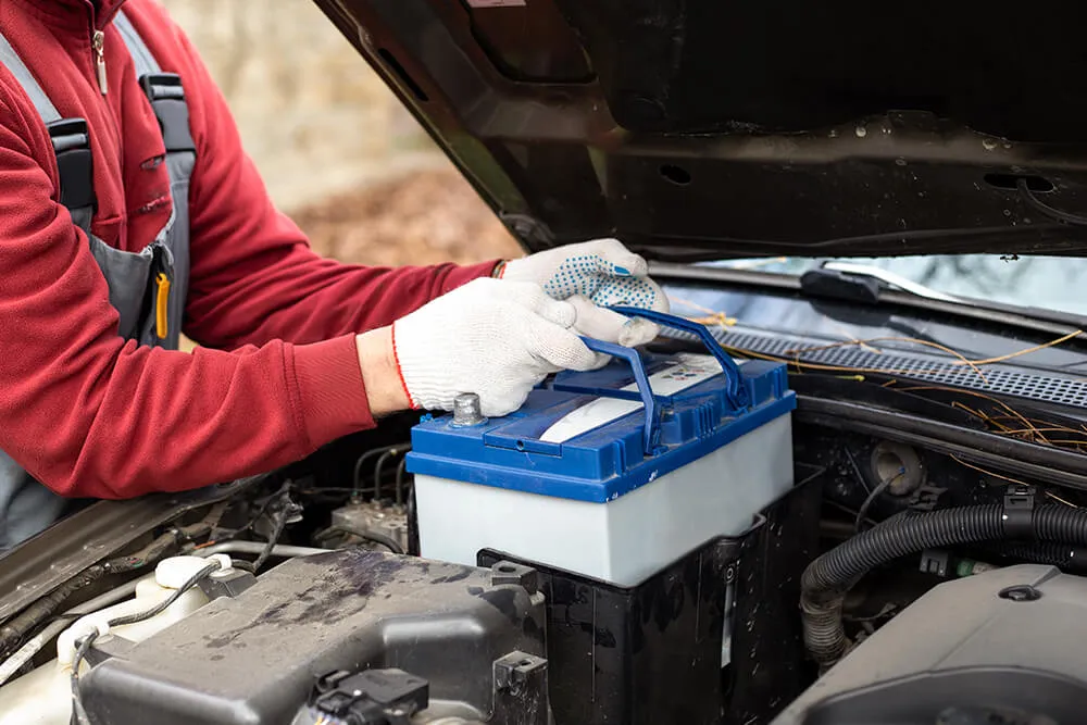 What Causes the Chemical Reaction Inside a Car's Battery?